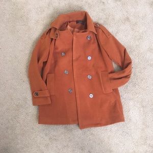 Burnt orange pea coat